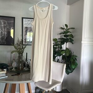 Cream, long body flattering dress.